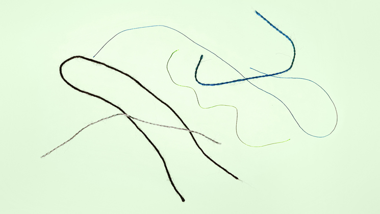 textilråvara på grön bakgrund