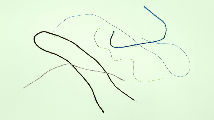 textilråvara på grön bakgrund